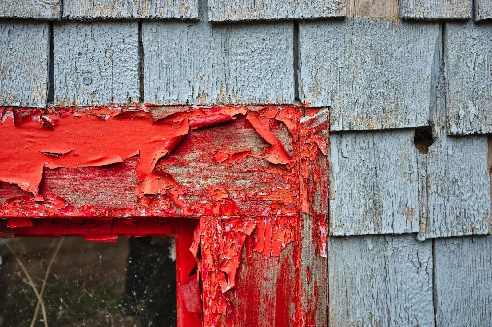 Peeling paint on exterior window trim